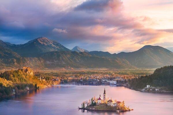 Lake Bled in Slovenia with its iconic island and medieval castle overlooking the crystal-clear waters